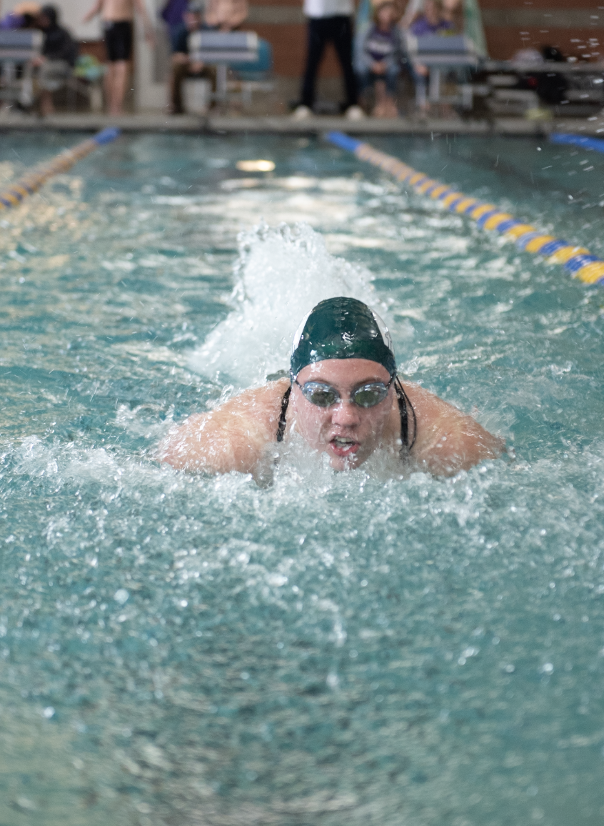 1.31.25 Junior Sarah Spini swimming 100 butterfly at Butte. 